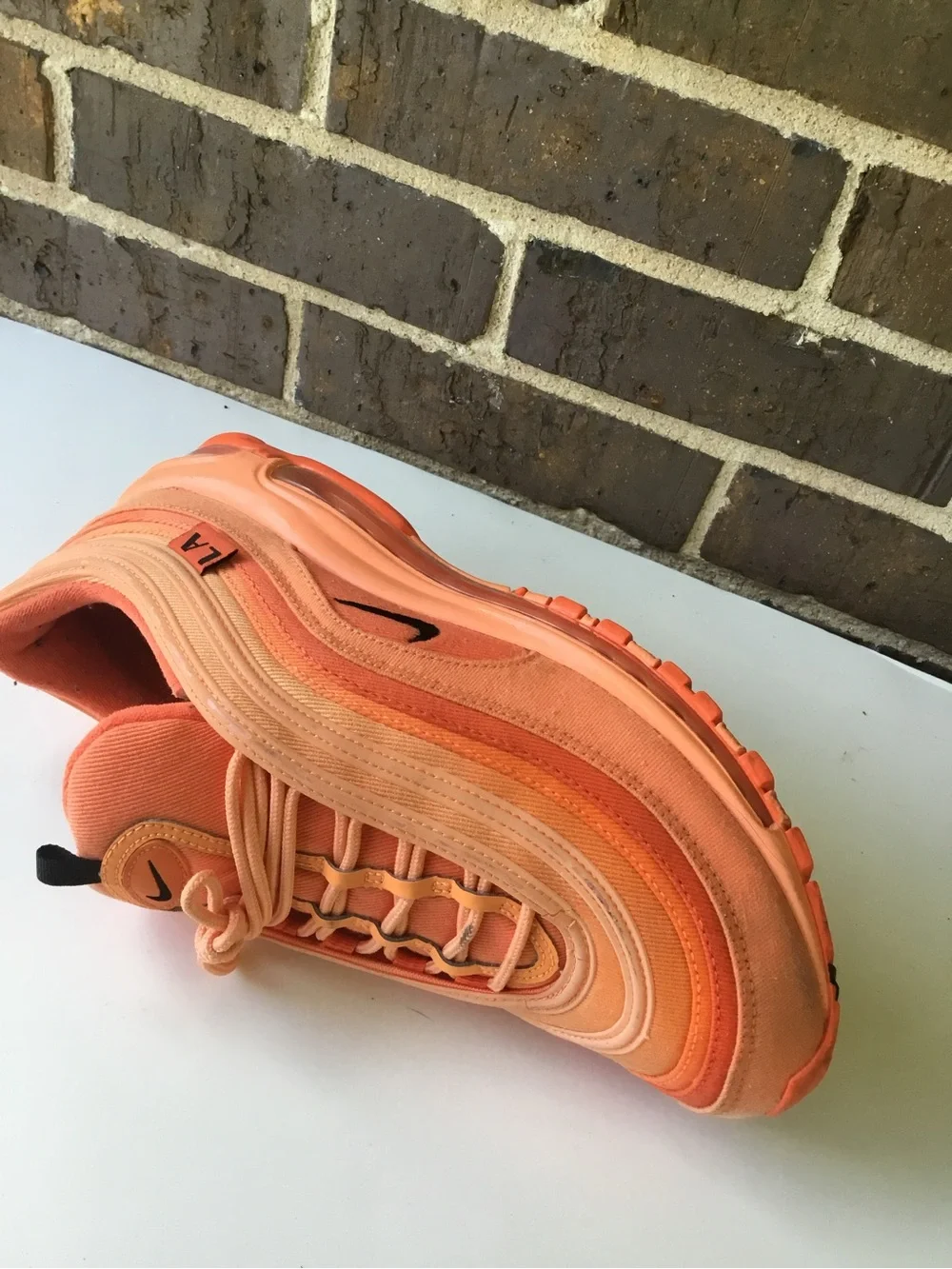 Nike Women’s Air Max 97 in Orange and Coral
